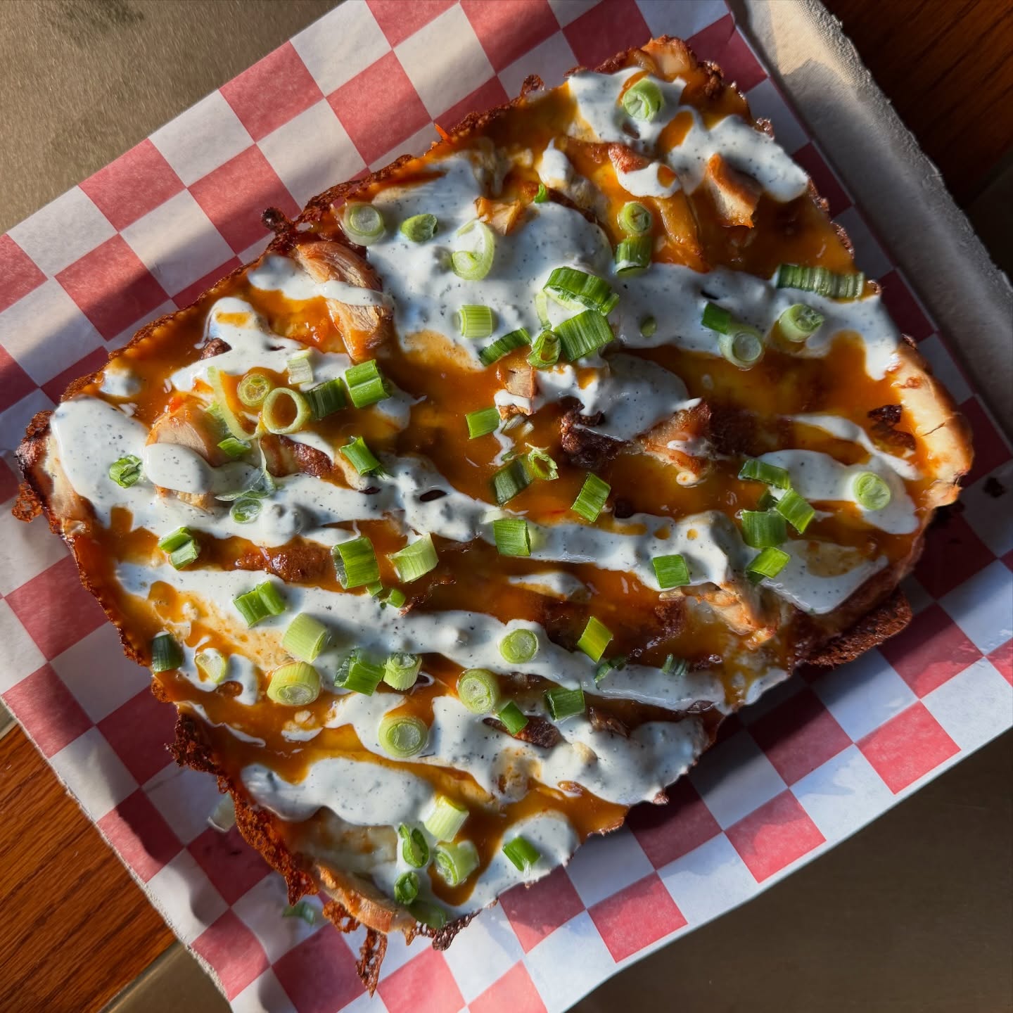 A specialty pizza made by Wishful Thinking Brewery