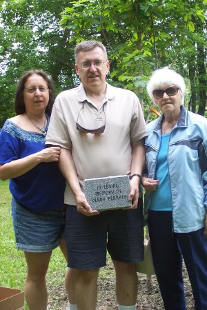 The family of Derry Bernath help dedicate a plaque and tree in his memory.