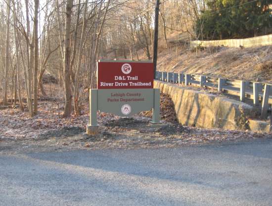 A new entrance sign welcomes visitors to the new trailhead on River Road.