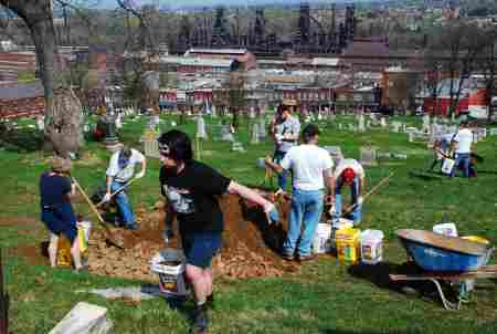 Volunteers cleanup St. Michael's cemetery. (Photo Courtesy of Dana Grubb)